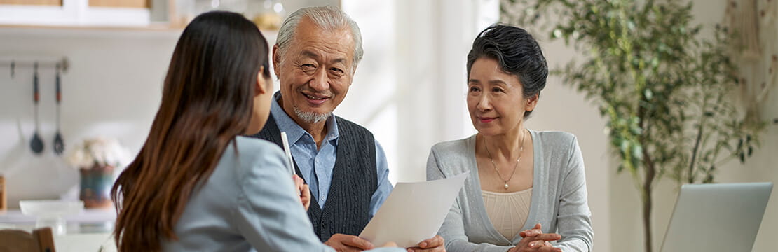Clients in a meeting with a financial advisor